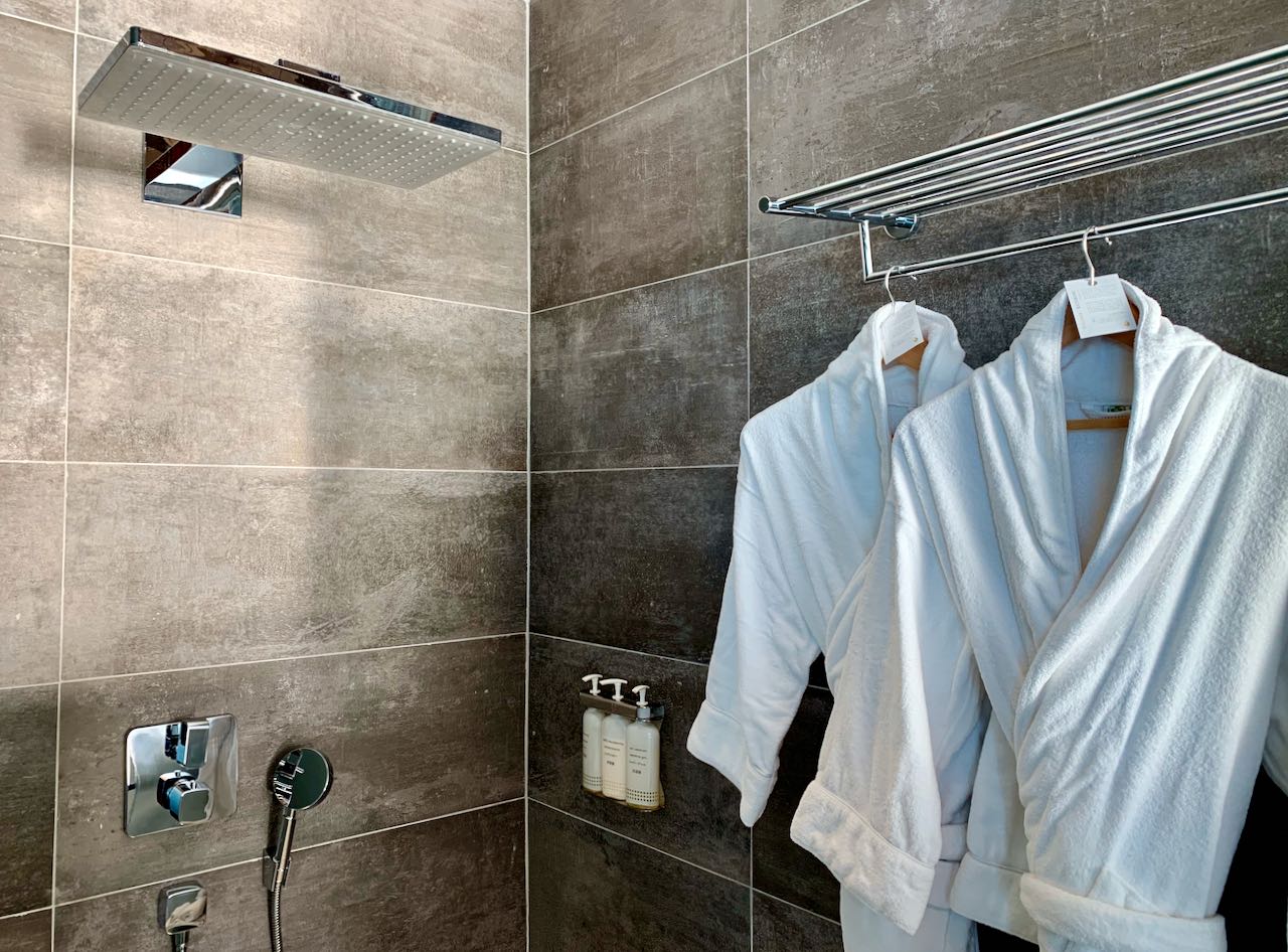 Shower and bathrobes The Brando Suite at the InterContinental Bora Bora Thalasso Review
