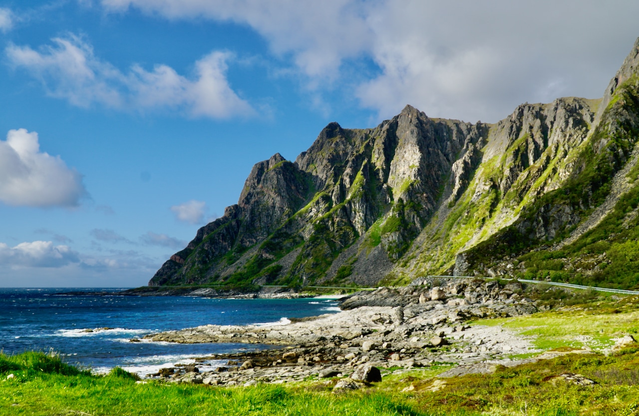 ANDØYA (Norwegian Scenic Route Andøya): Majestic mountains plunge into the sea along the Norwegian Scenic Route of Andøya.